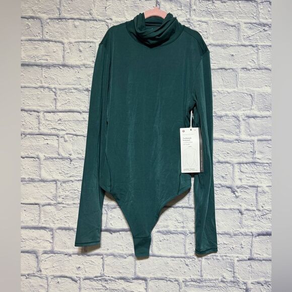 Lululemon Wundermost Ultra-Soft Nulu Turtleneck Bodysuit
Storm Teal - Picture 11 of 15
